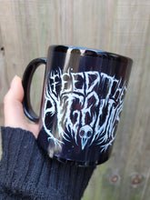 'Feed The Pigeons' Black Glossy Mug